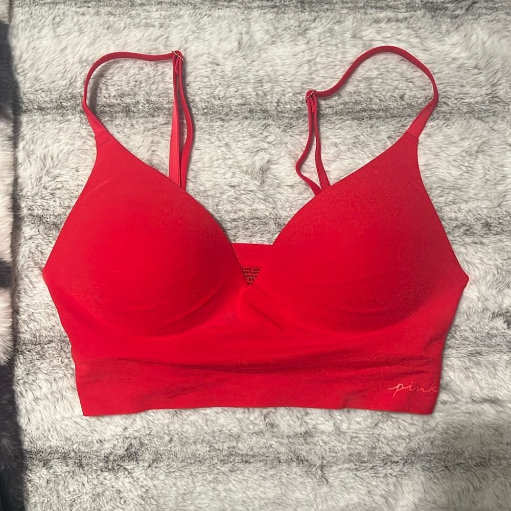 Never before worn red Victoria secrets wireless push up bra. Size XS.